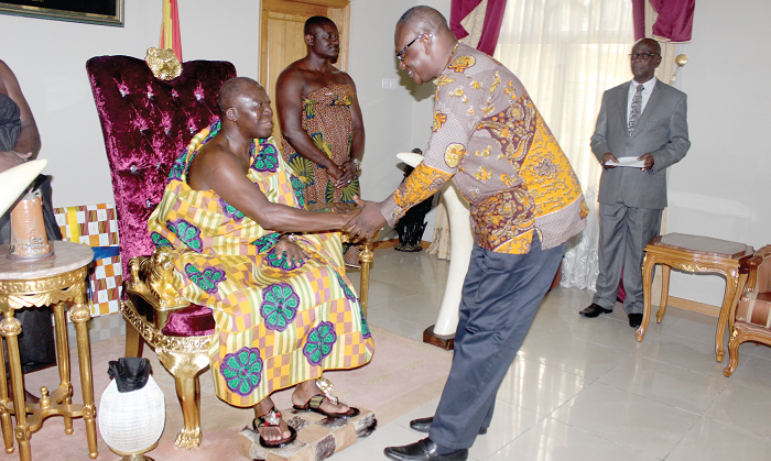  Mr Prosper Bani in a handshake with the Asantehene, Outumfuo Osei Tutu II, when he called on him during his two-day tour of the Ashanti Region